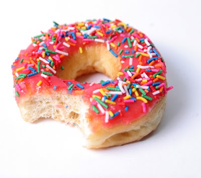 pink-glazed-donut-with-sprinkles